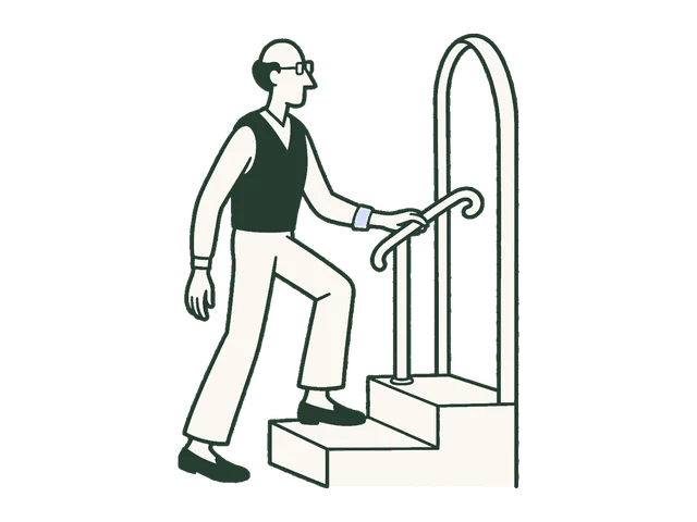 An older adult using a handrail at their front door.
