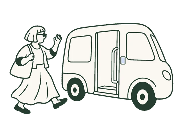 An older adult approaching a community shuttle.